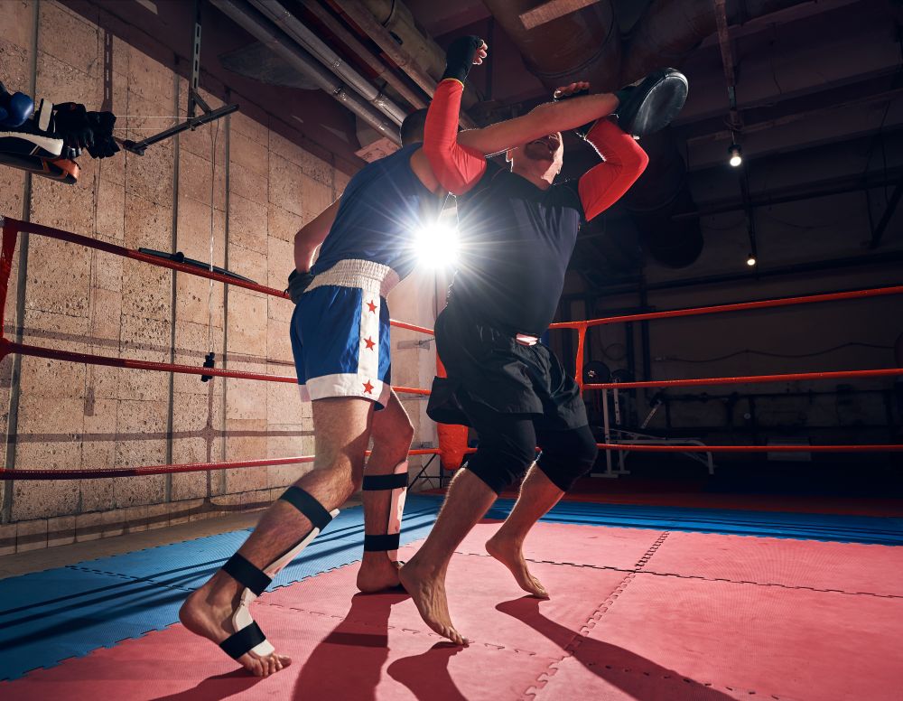 wrestlers training wearing knee pads